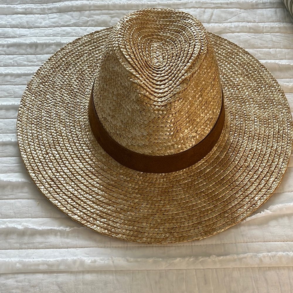NWOT. Straw Hat with suede trim. Perfect for summer!